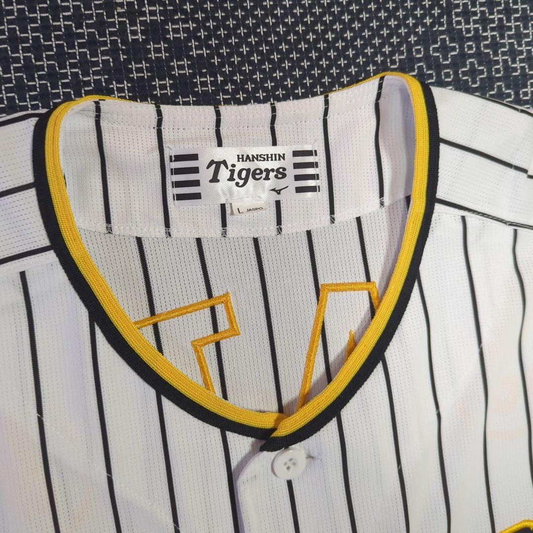 阪神タイガース　チャンピオン　エンブレム付き　ユニフォーム　佐藤輝明【Ｌサイズ】