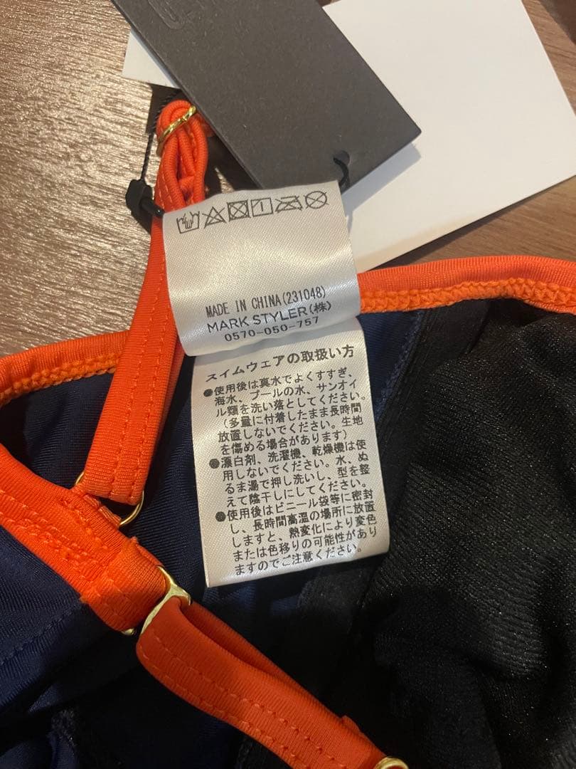 PAMEOPOSE パメオポーズ　ネイビーオレンジ ペプラム水着 2ピース