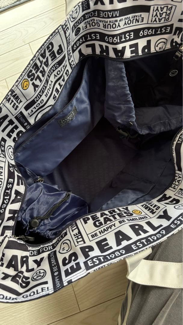 パーリーゲイツ　ロッカーバック　ニュースペーパー柄